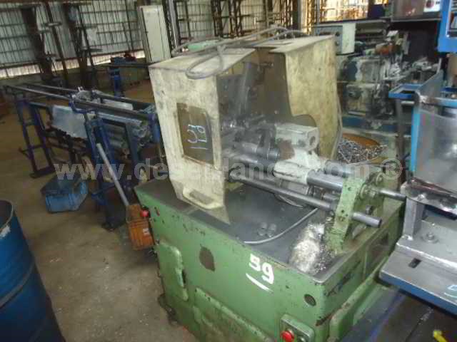 59/23062 - TORNO AUTOMÁTICO M/TRAUB TIPO A60, C/ALIMENTADOR MECÂNICO. 
