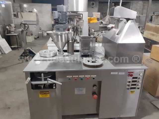 42/23183 - ENCAPSULADORA EM INOX SEMI AUTOMÁTICA M/CAPSUGEL. 
