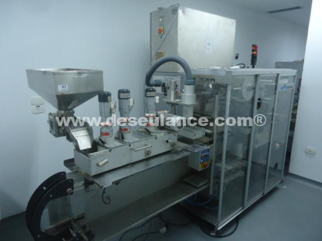 61/26027 - EMBLISTADEIRA AUTOMÁTICA M/UHLMANN MOD. UPS-300,