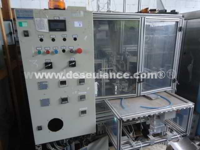 03/26036 - MÁQ. MONTADORA AUTOMÁTICA DE PEÇAS PORT. P/BOLSA M/HL 