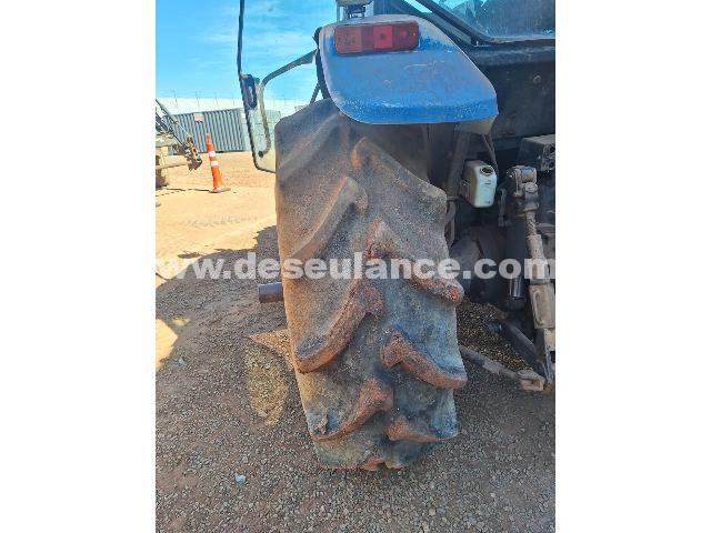 06/26054 - TRATOR NEW HOLLAND TM 135 + PULVERIZADOR DE BARRA STARA 2000